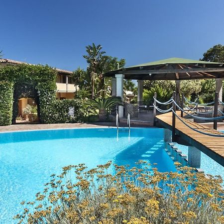Гостевой дом Relais Fenicottero Rosa Порто-Таверна Экстерьер фото