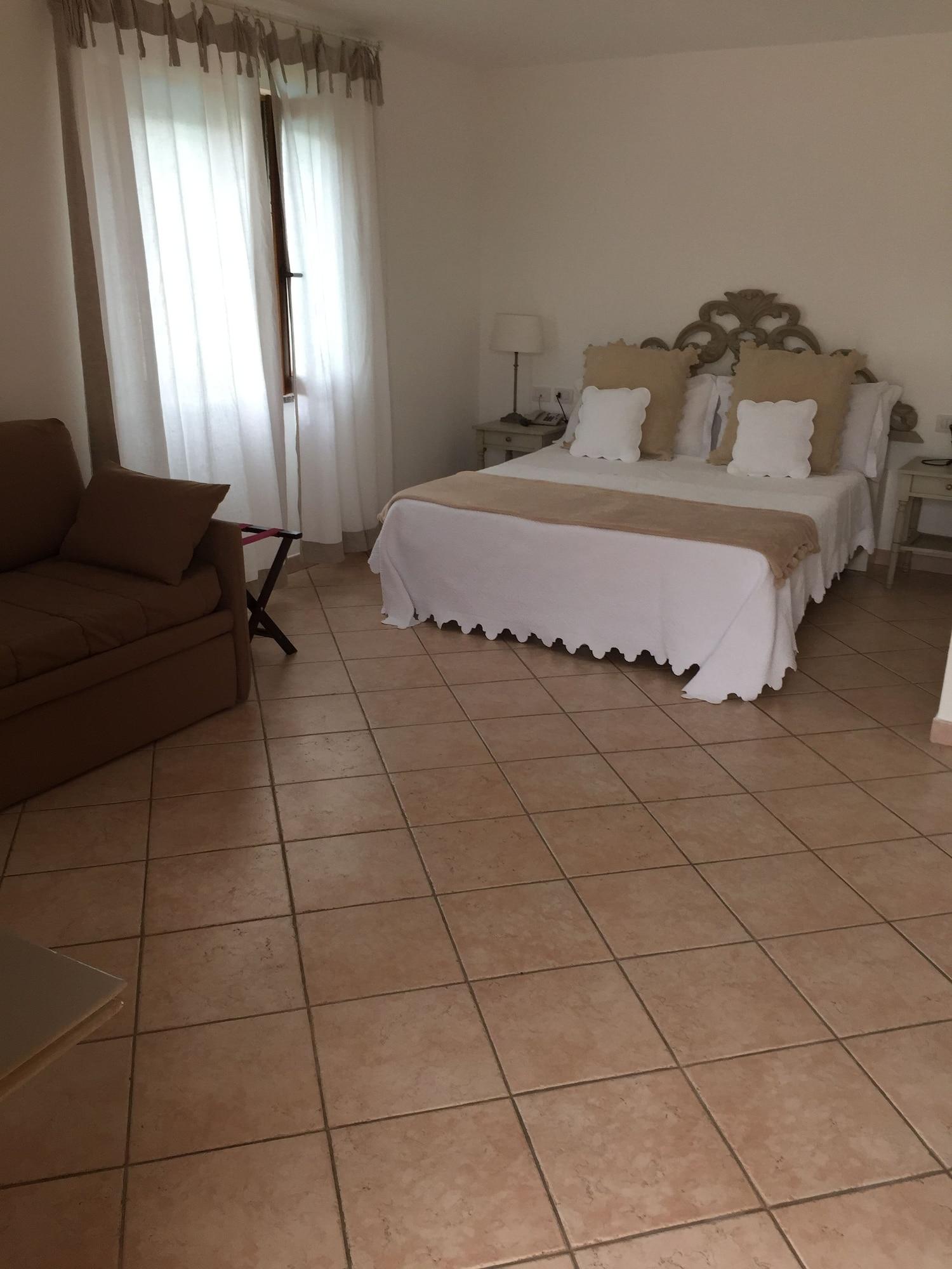 Гостевой дом Relais Fenicottero Rosa Порто-Таверна Экстерьер фото
