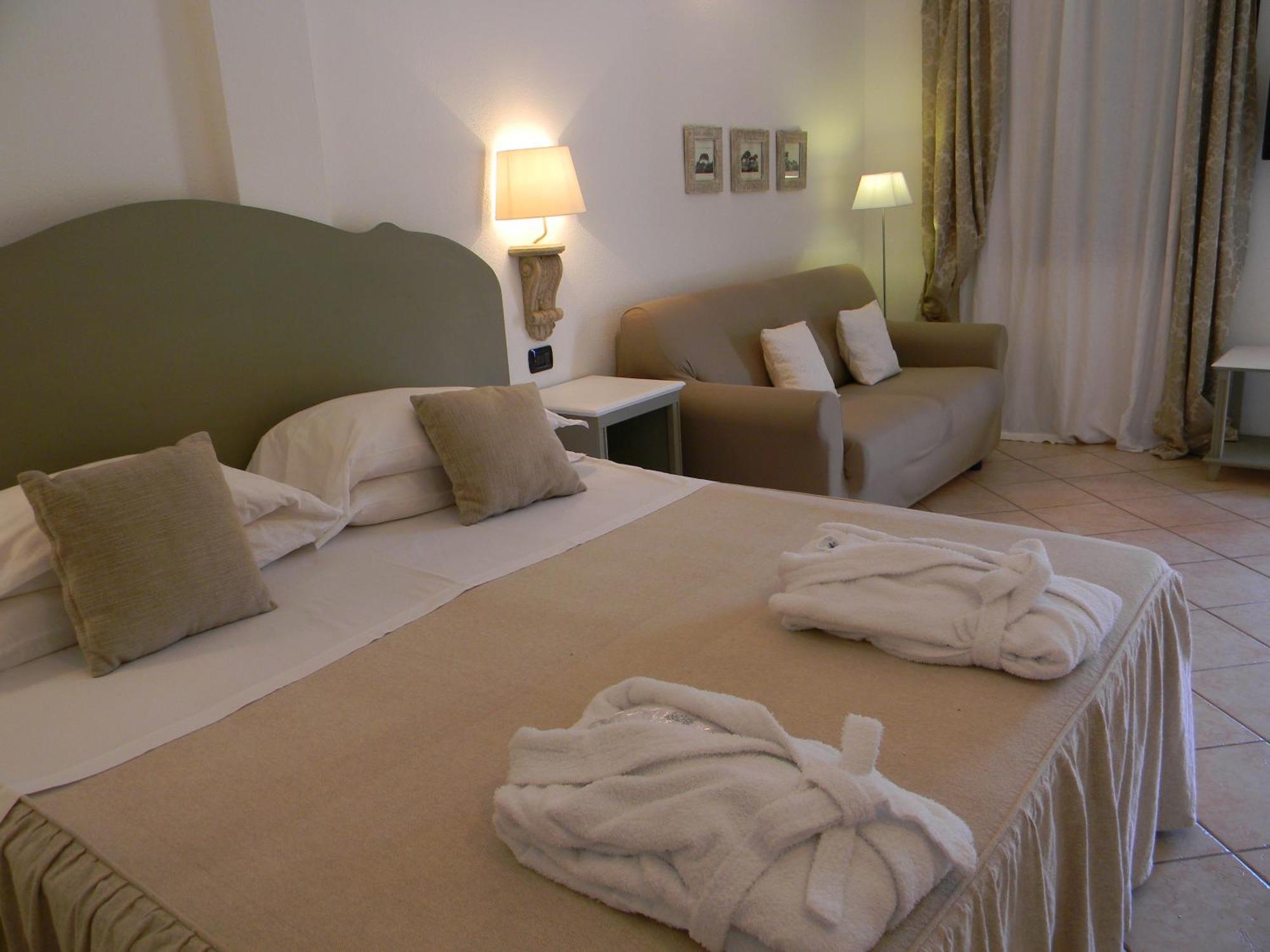 Гостевой дом Relais Fenicottero Rosa Порто-Таверна Номер фото